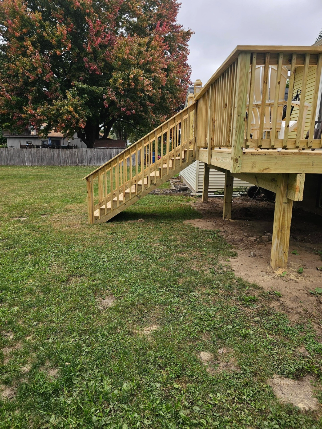 Repaired deck stairs and railings
