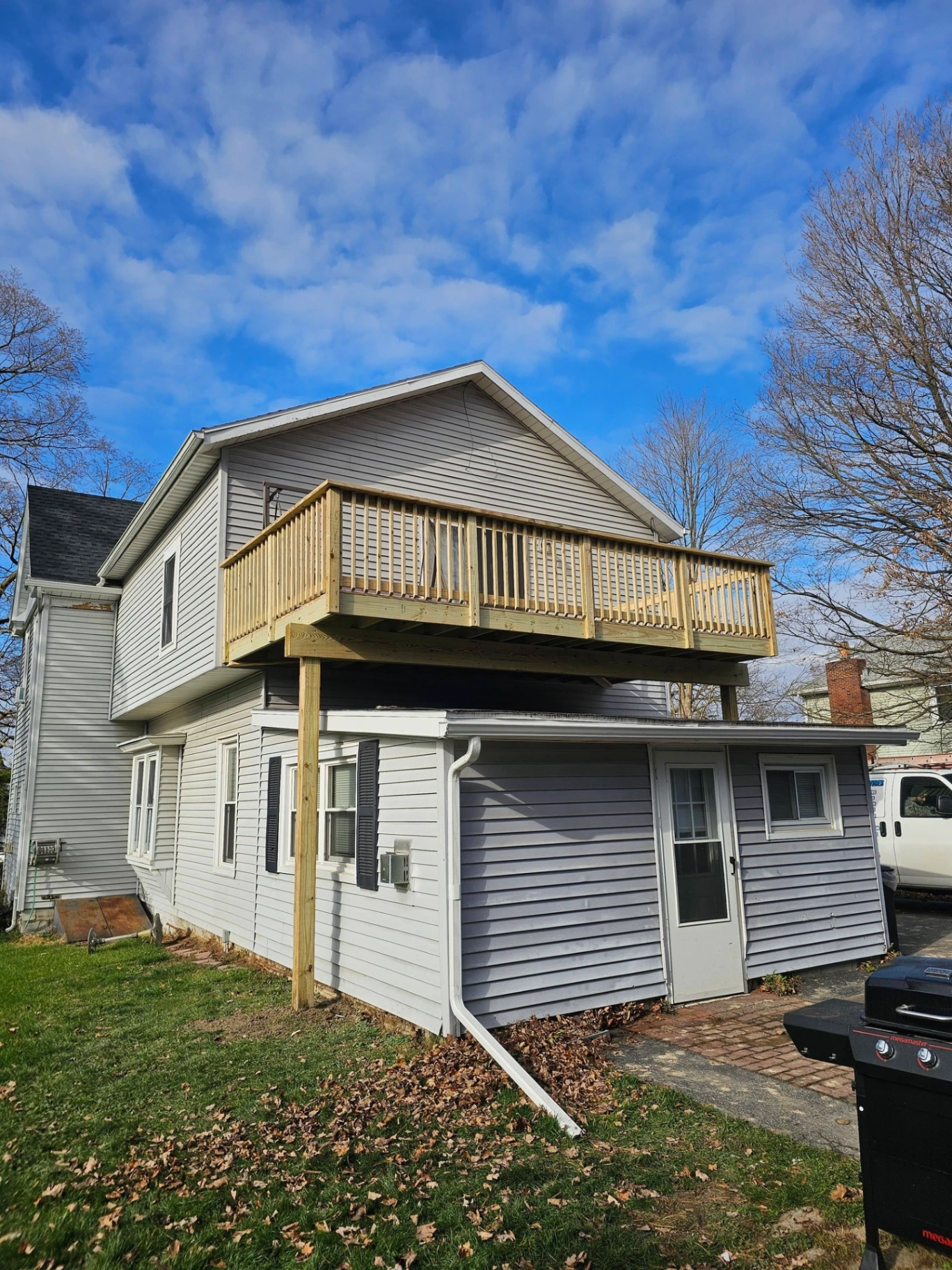 Exterior trim and balcony painting on a residential home